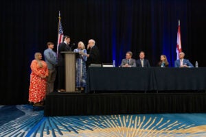 Taylor T. “Tom” Perry, Jr. recites the oath of office as the 149th president of the Alabama State Bar as Alabama Supreme Court Chief Justice Tom Parker administers the oath.