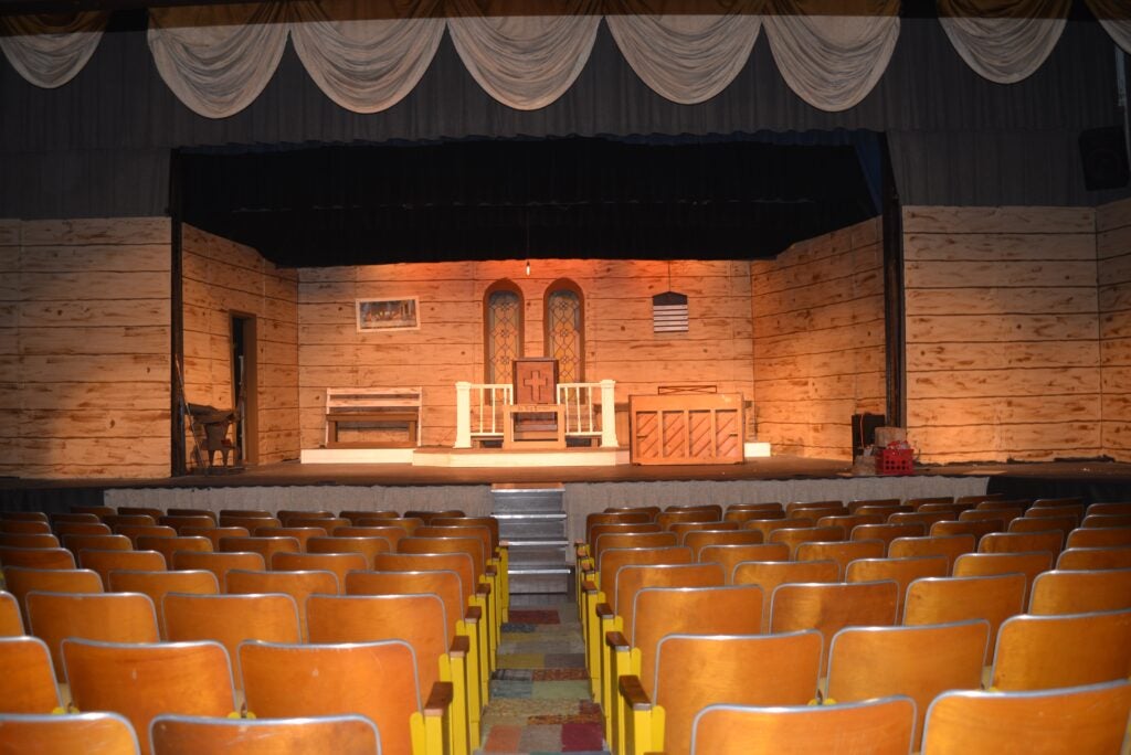 Canebrake players use the stage of the old school for their performances.